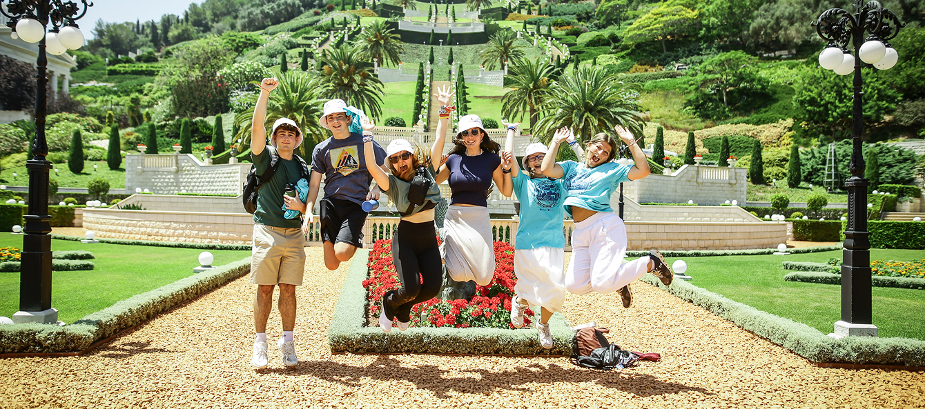 Group of diverse young people smiling at a community event