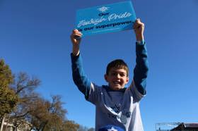 Group of people celebrating on stage