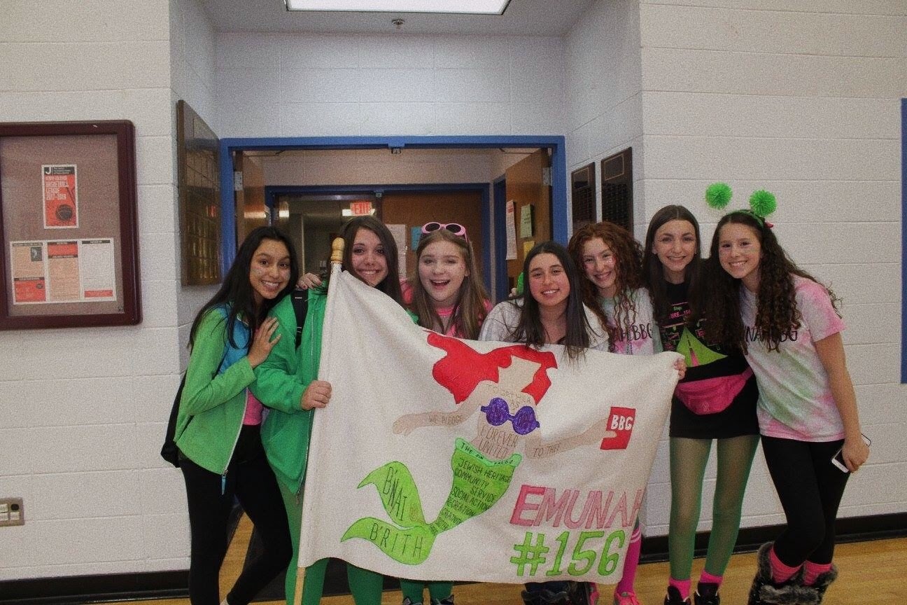 Group of people celebrating on stage