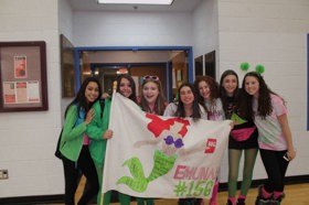 Group of people celebrating on stage