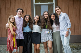 Group of people celebrating on stage