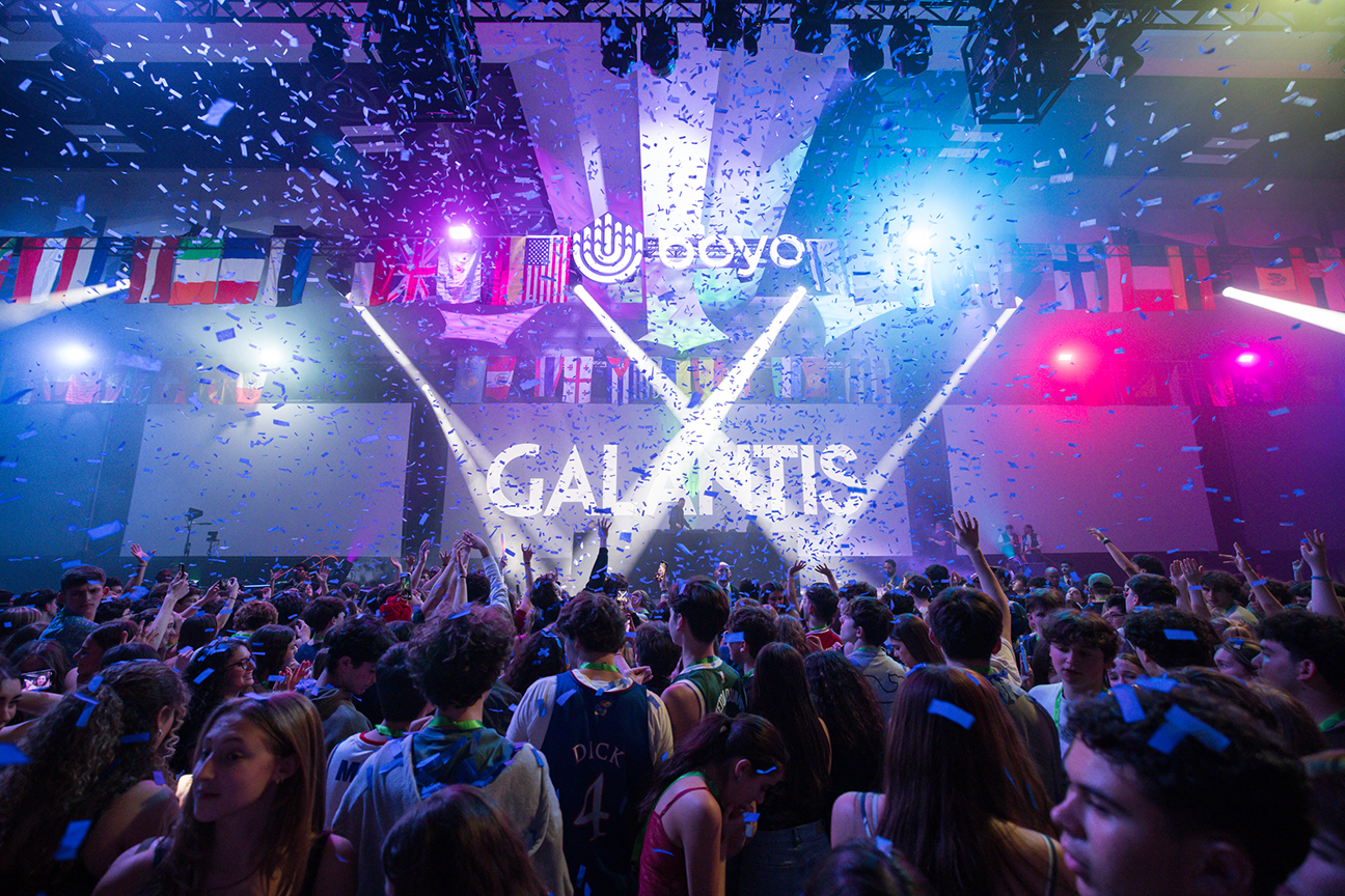 Group of people celebrating on stage