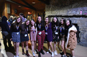 Group of people celebrating on stage