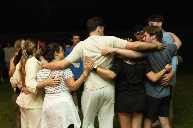 Group of people celebrating on stage