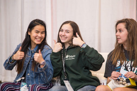 Group of people celebrating on stage