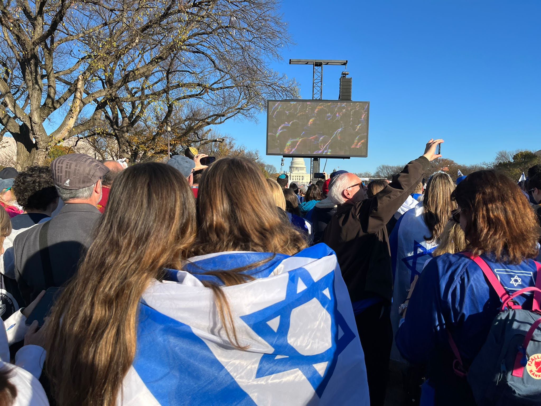 Group of people celebrating on stage