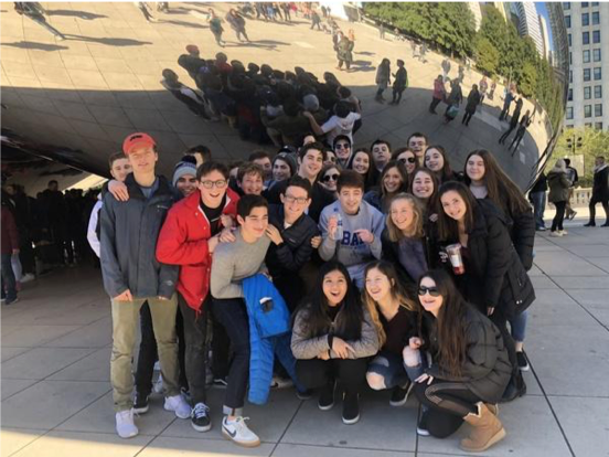 Group of people celebrating on stage