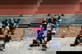 Group of people celebrating on stage