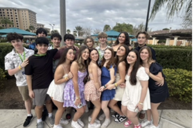 Group of people celebrating on stage