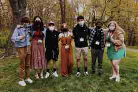 Group of people celebrating on stage