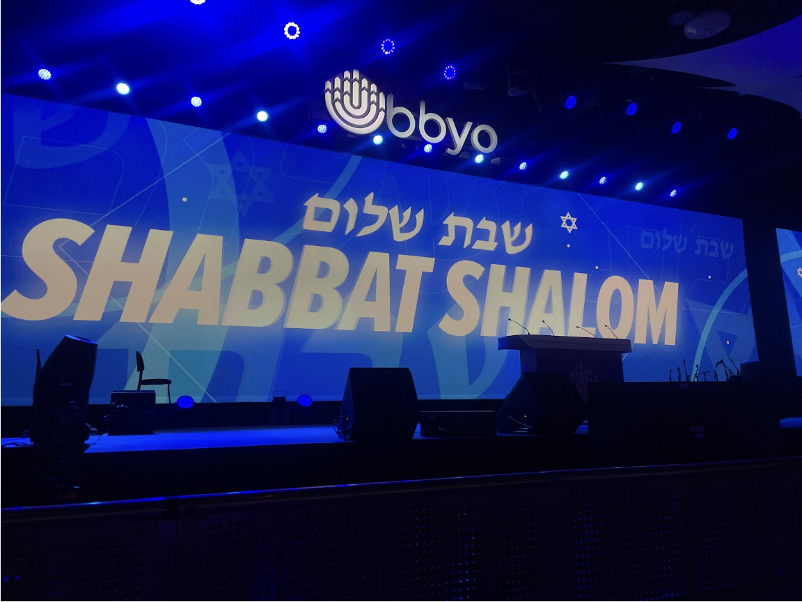 Group of people celebrating on stage