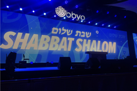 Group of people celebrating on stage