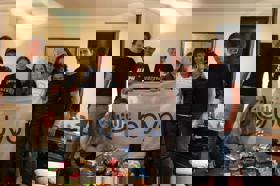 Group of people celebrating on stage