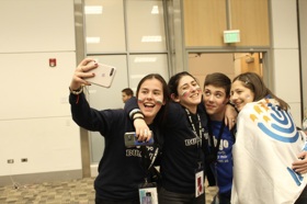 Group of people celebrating on stage