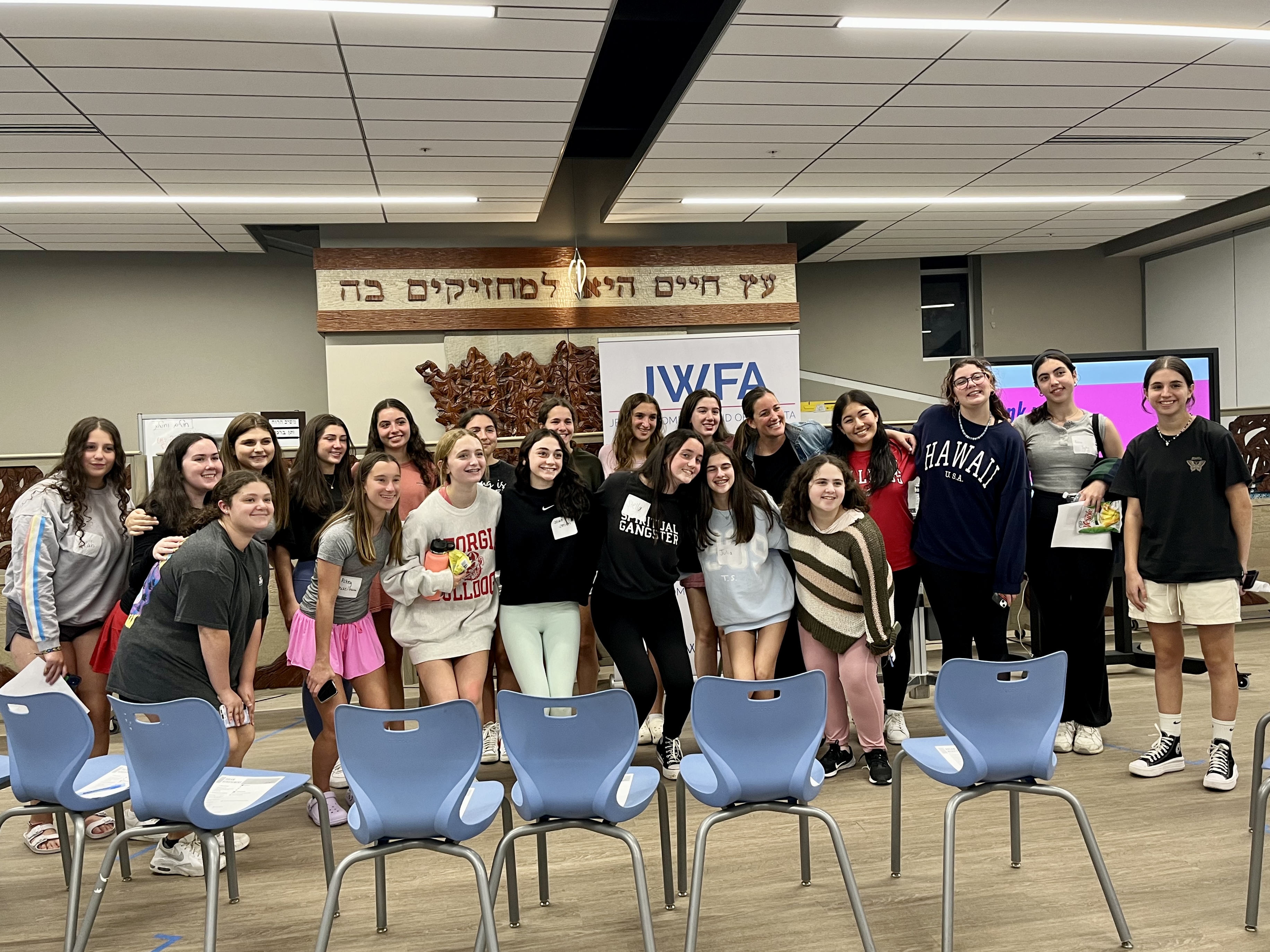 Group of people celebrating on stage