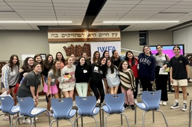 Group of people celebrating on stage