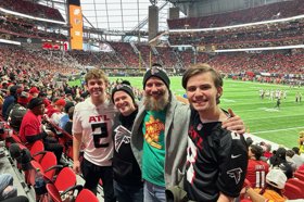 Group of people celebrating on stage