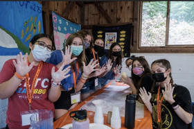 Group of people celebrating on stage
