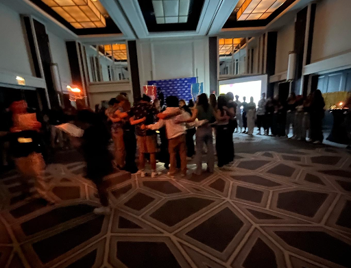 Group of people celebrating on stage