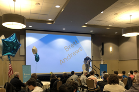 Group of people celebrating on stage