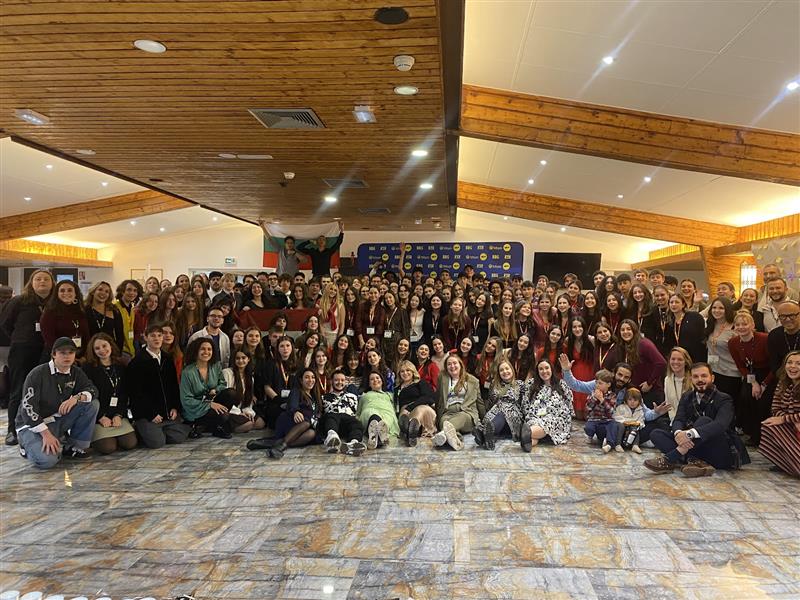 Group of people celebrating on stage