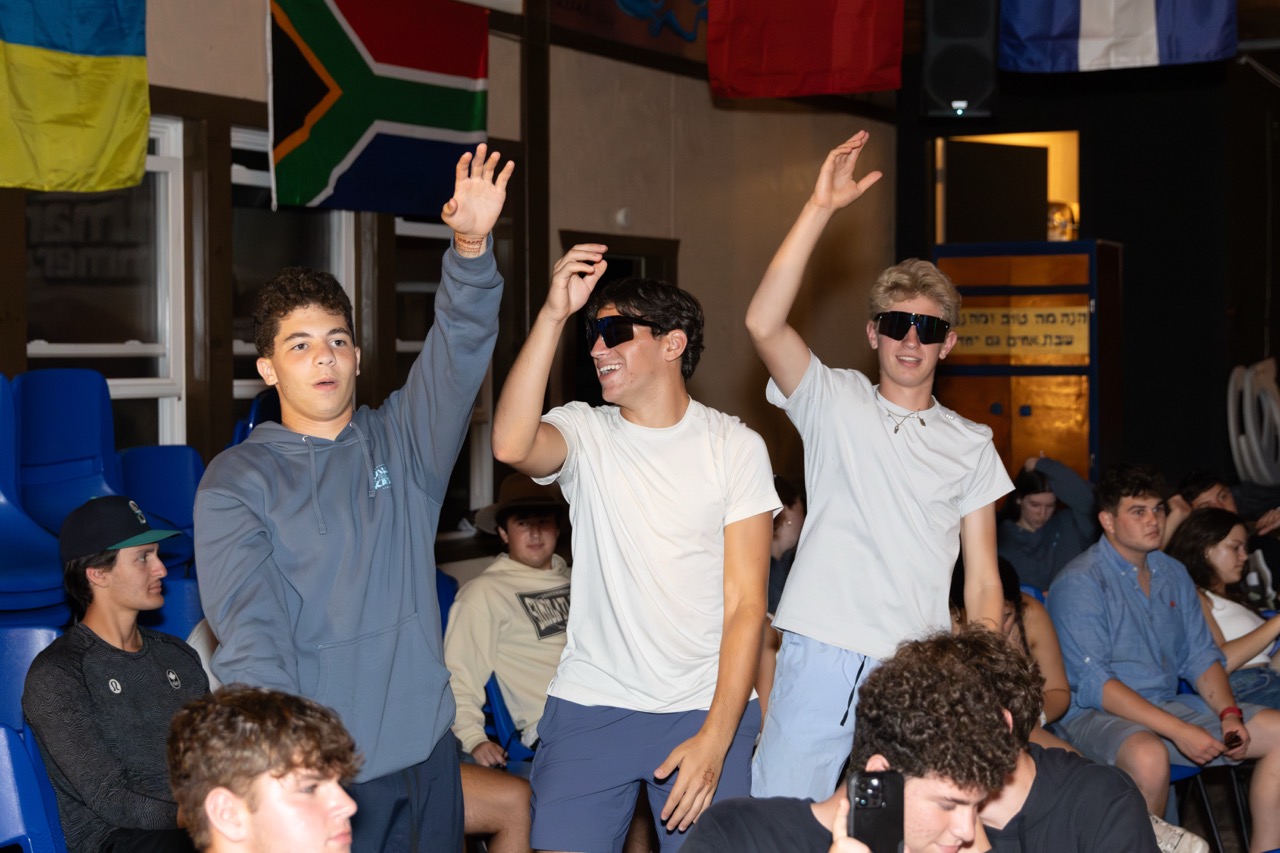 Group of people celebrating on stage