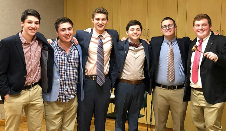 Group of people celebrating on stage