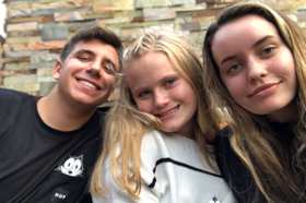 Group of people celebrating on stage