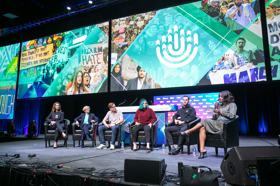 Group of people celebrating on stage