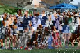 Group of people celebrating on stage