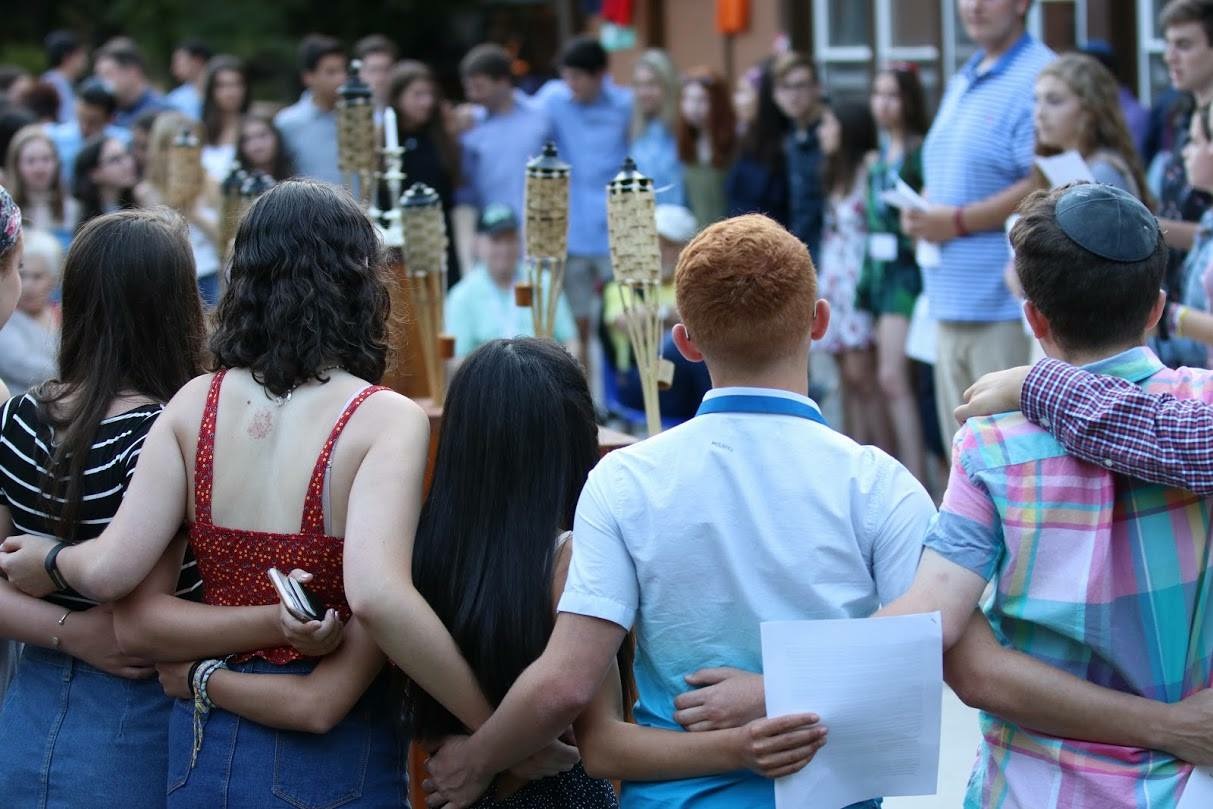 Group of people celebrating on stage