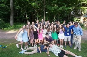 Group of people celebrating on stage