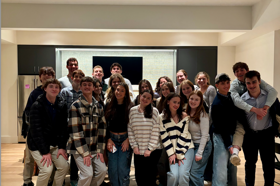 Group of people celebrating on stage