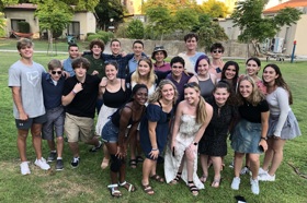 Group of people celebrating on stage