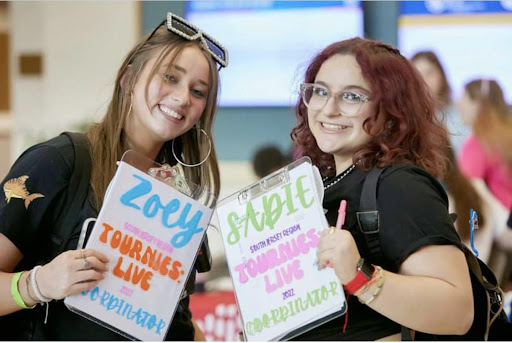 Group of people celebrating on stage