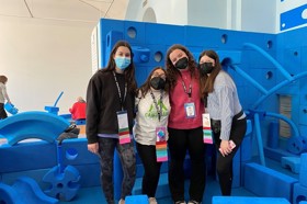 Group of people celebrating on stage