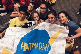 Group of people celebrating on stage