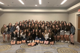 Group of people celebrating on stage