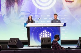 Group of people celebrating on stage