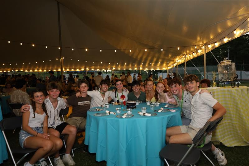 Group of people celebrating on stage