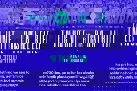 Group of people celebrating on stage