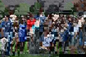 Group of people celebrating on stage