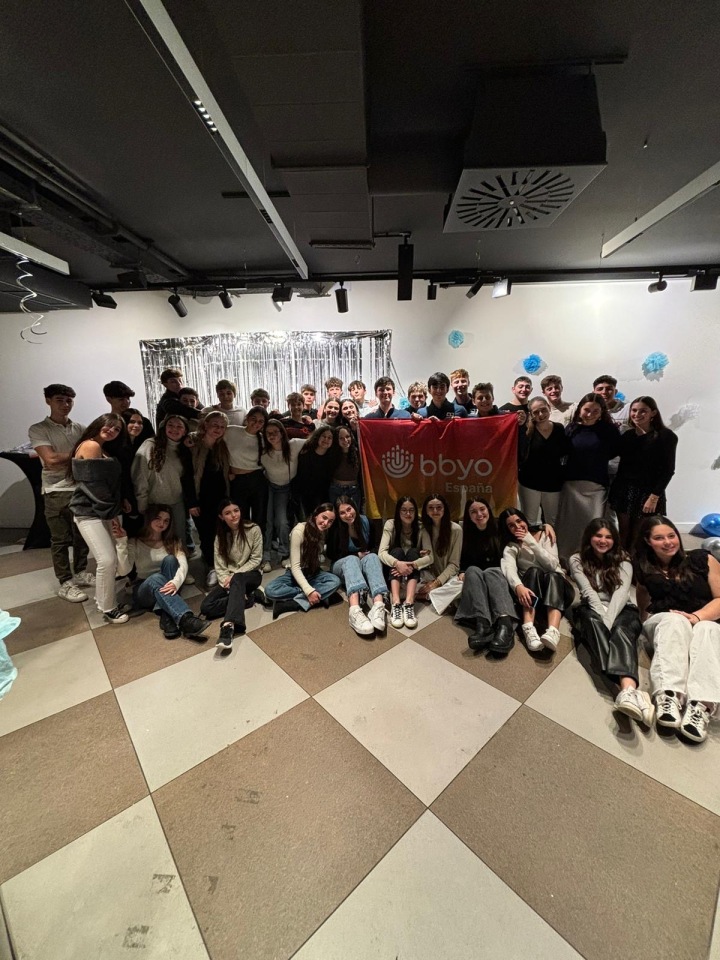 Group of people celebrating on stage