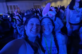 Group of people celebrating on stage