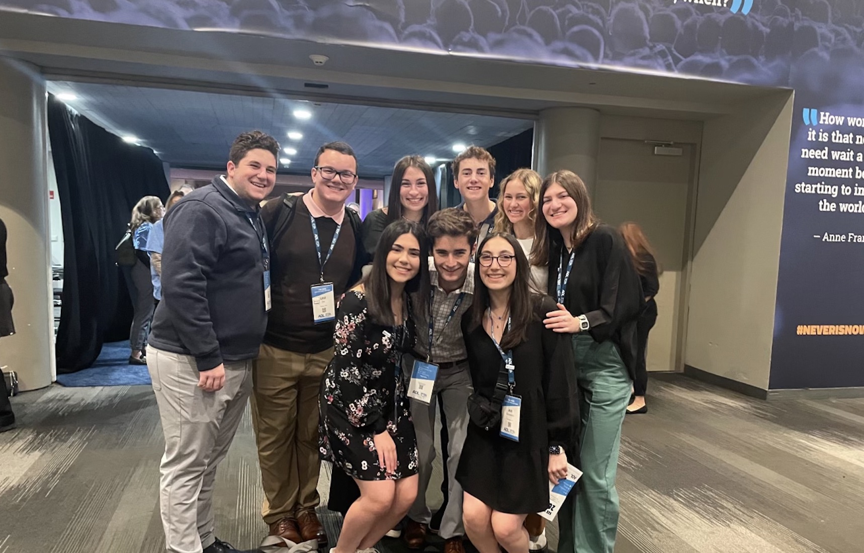Group of people celebrating on stage