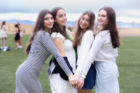 Group of people celebrating on stage