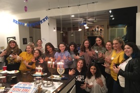 Group of people celebrating on stage