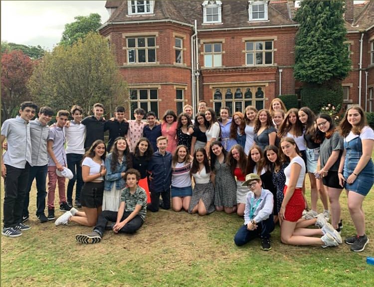 Group of people celebrating on stage