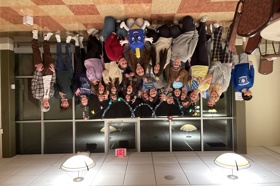 Group of people celebrating on stage