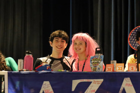 Group of people celebrating on stage